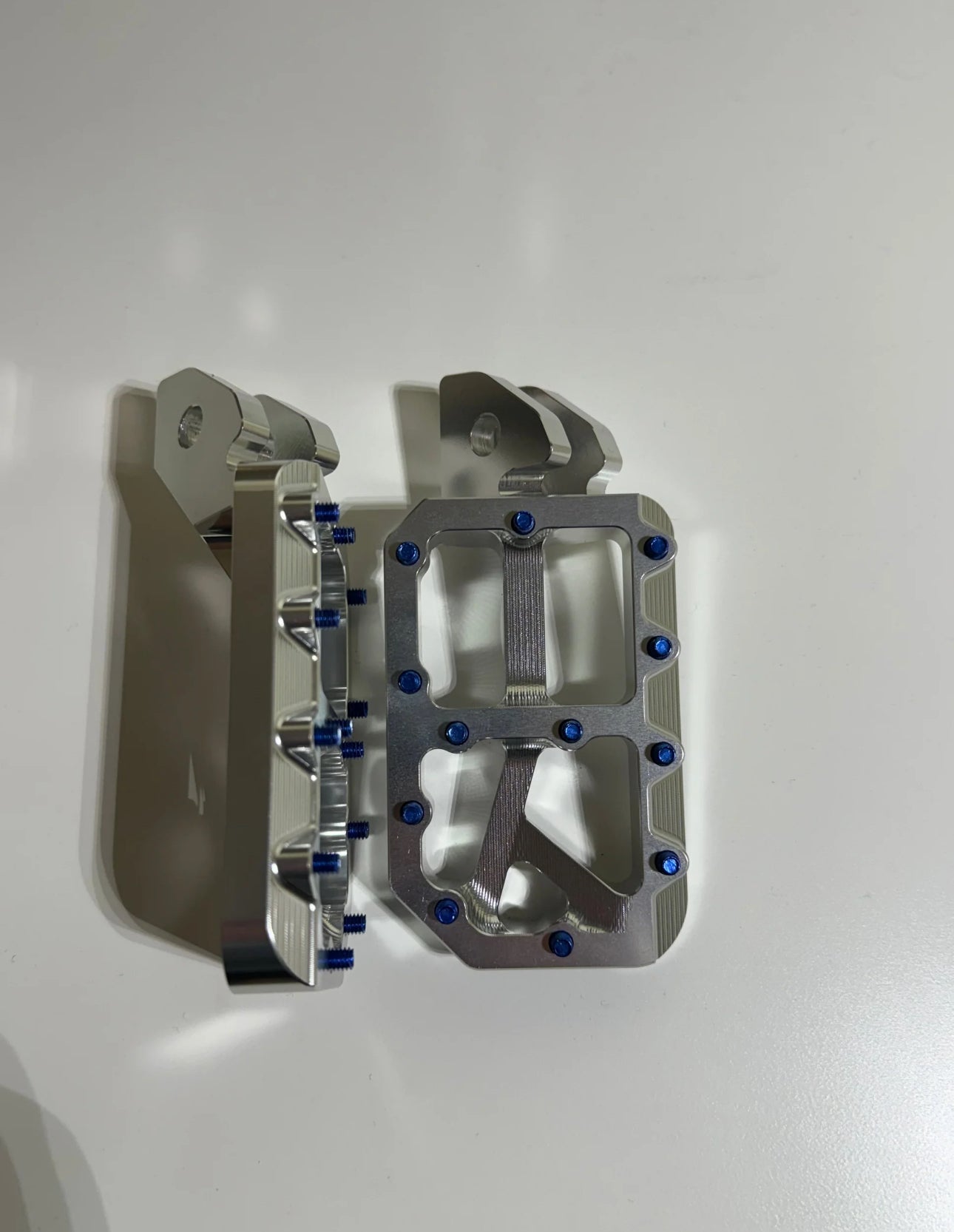 Silver with titanium Surron/Talaria/E-ride pro pegs